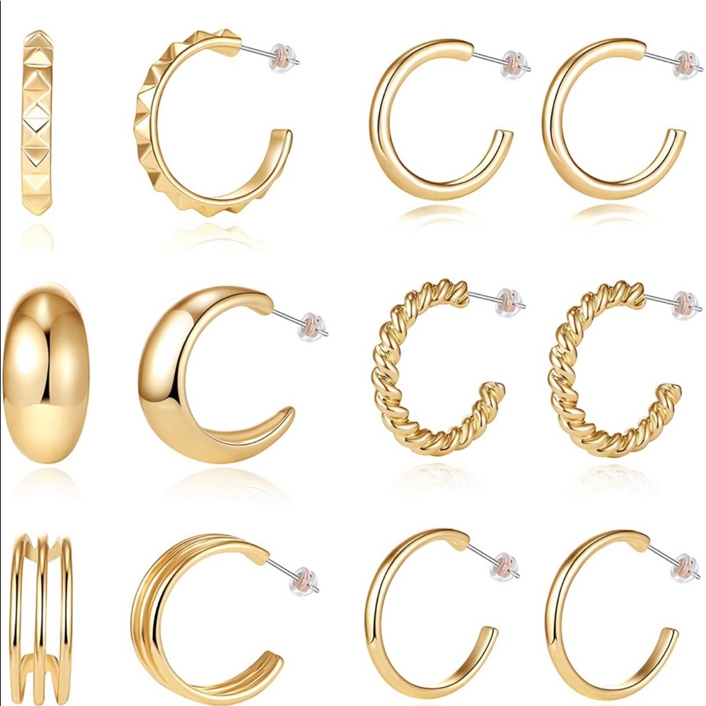 6 pair of small hoop earrings in yellow gol